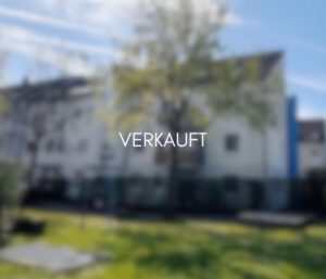 verschwommenes Bild einer Hauses, welches in Köln von W&L Immobilien Viersen verkauft wurde. Darüber steht in Versalien VERKAUFT.